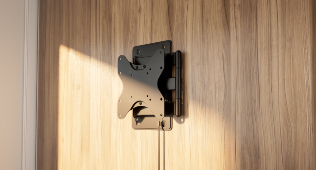 Low-profile RV TV mount retracts close to the wall