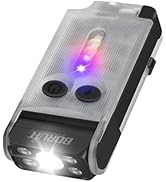 Compact LED bicycle light in silver/gray housing, featuring bright white front lights and purple/blue indicator light on top.