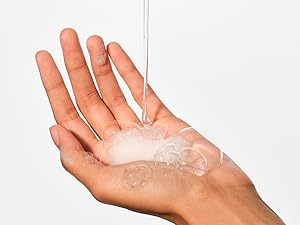 Native bodywash shown in hand, highlighting its clear nature and gentle formula