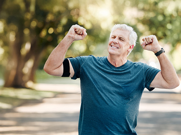 Sequence of outdoor shots showing someone in a blue t-shirt demonstrating stretching or exercise movements.