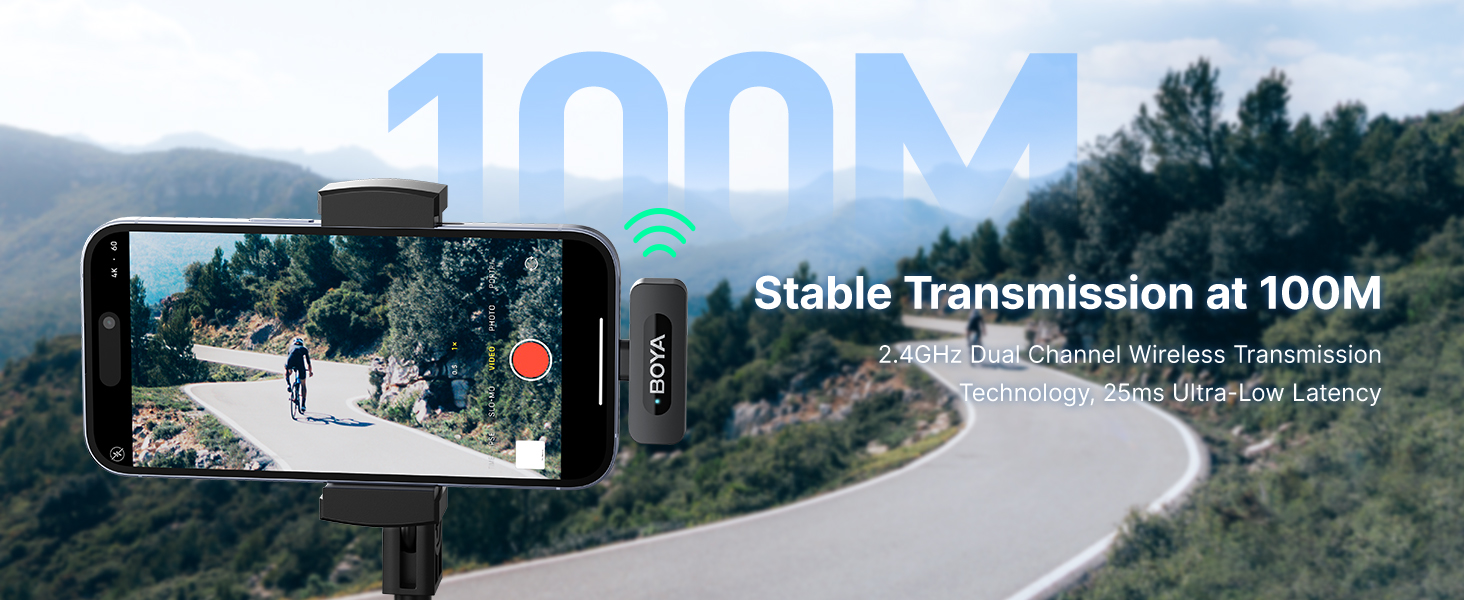 Smartphone screen displaying motorcycle rider on mountain road with text overlay indicating 100M stable transmission range capability.
