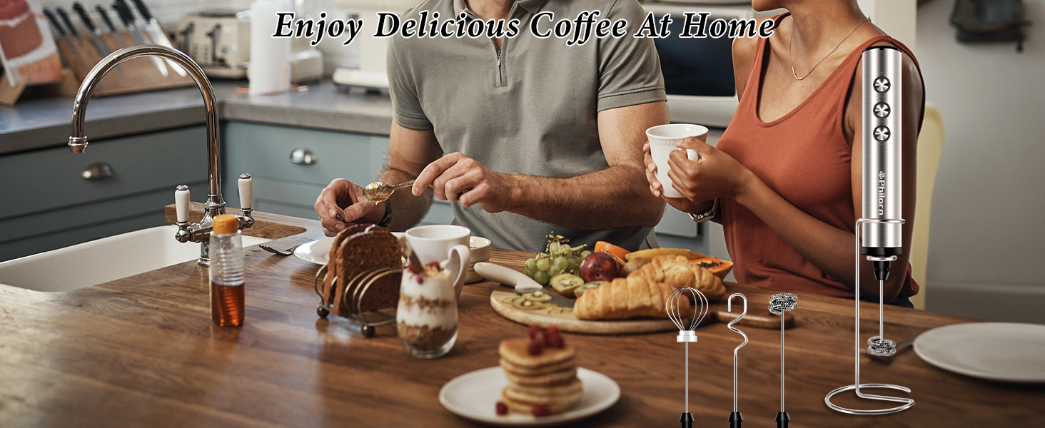 Kitchen counter with people enjoying wine and appetizers. Wine glasses, bottles, and a variety of snacks are visible on the surface.