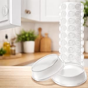 Clear cabinet door bumpers installed on kitchen cabinet doors to reduce noise and protect surfaces