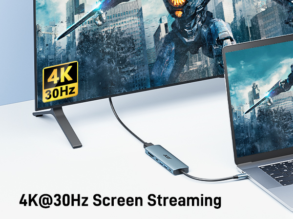 Screen streaming device showcasing 4K@30Hz capability. Image displays a laptop connected to a large TV screen with action scene.