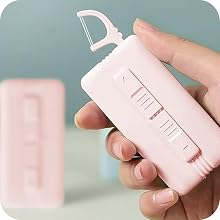 Floss stick pops out