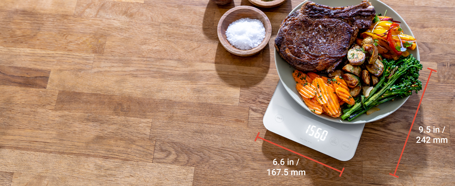 The size is 9.5 in / 242 mm length, 6.6 in / 167.5 mm width