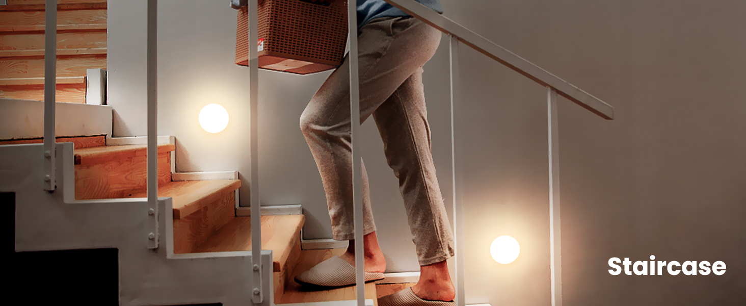 a person walking down a staircase with a box on their back.