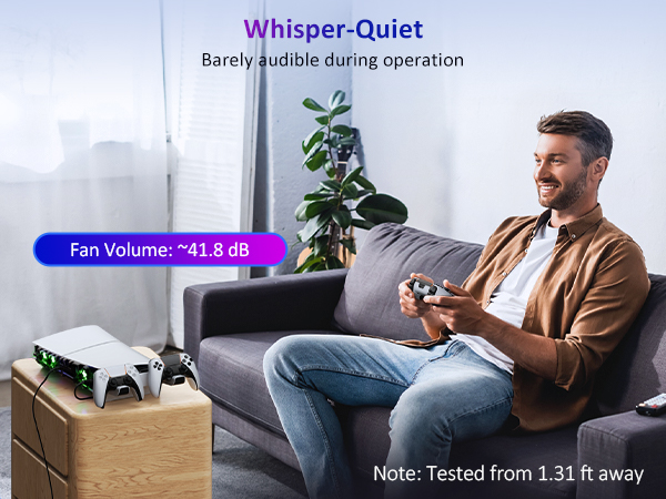 A man is sitting on the sofa playing games, and the product produces almost no sound.