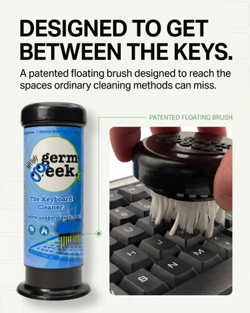 Germ Geek cleaner with patented floating brush reaching between keyboard keys.