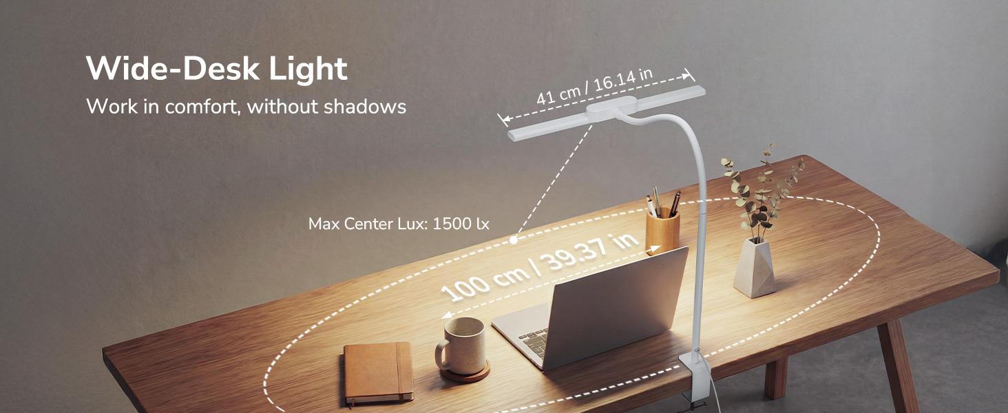 Text reads 'Wide-Desk Light'. Diagram showing desk lamp measurements and illumination coverage across a wooden desktop surface.