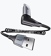 Silver and black USB car charger with coiled cable, featuring dual ports for device charging in vehicles.