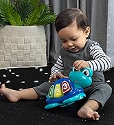 baby with take along toy