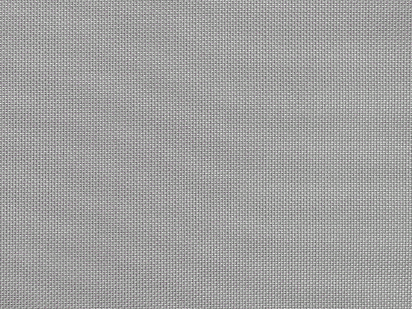 Close-up view of a light gray textured fabric or material with a uniform pattern of small, raised dots across the surface.