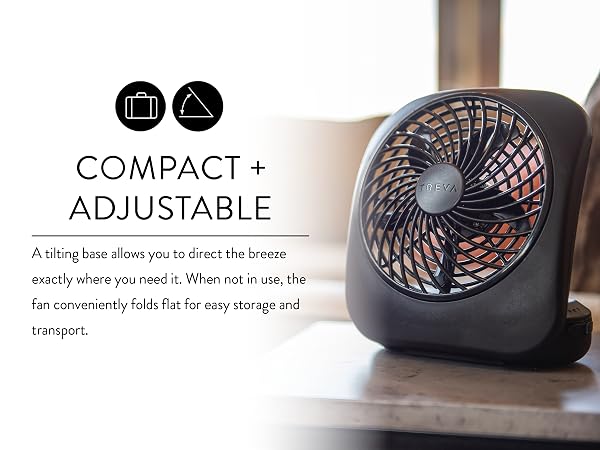Treva 5 Inch Desk Fan Gray on living room table