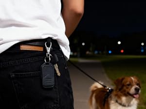 Remote on a belt keychain for hands-free access while walking your dog.