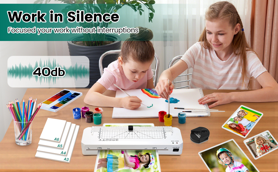 Text reads 'Work in Silence' '40db'. Study scene with art supplies, colored blocks, and writing materials on desk surface.