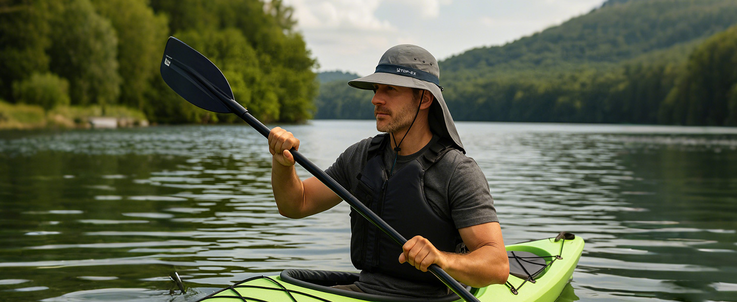 Man kayaking on lake wearing TOP-EX cooling sun hat with neck flap and wide brim for sun protection