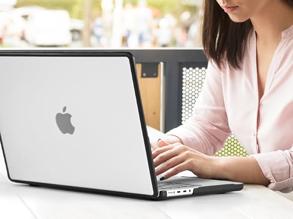 a woman using a laptop computer