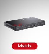 Slim black rectangular electronic device, likely a network switch or router. Red label on front reads 'Matrix'.