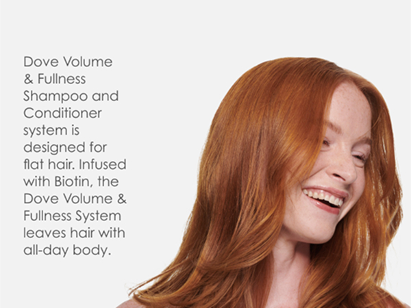 Smiling woman with healthy-looking red hair, next to text about Biotin and its benefits.
