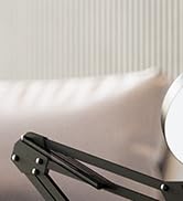 Adjusting the rotary arm magnifying lamp with light magnifying glass with stand