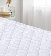 White gridded fabric or mesh material partially shown, appears to be textile or protective covering surface.