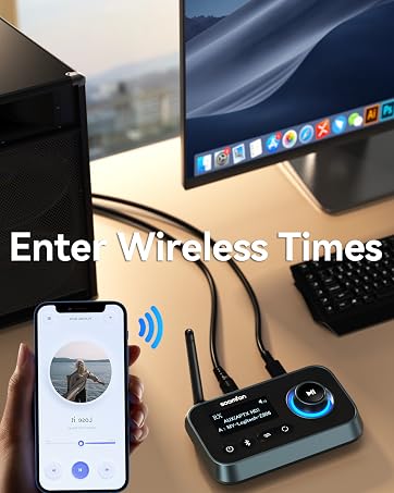 Wireless audio transmitter connected to smartphone and computer. Device has circular interface with blue light. Phone displays audio controls.