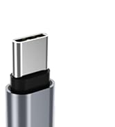 Close-up of USB-C connector tip showing metallic plug portion in silver and black housing.
