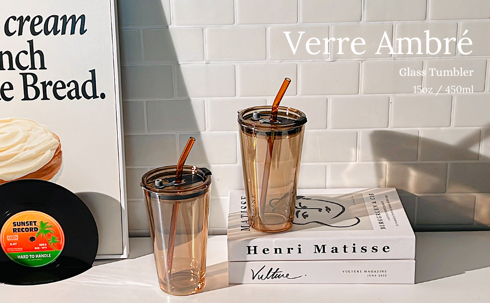glass cups with lids and straws