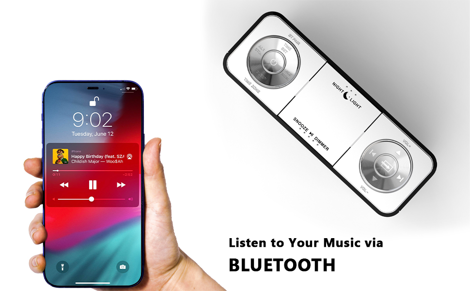Smartphone displaying music interface next to wireless Bluetooth controller with dual circular control wheels and buttons.