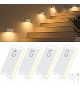 Series of four white rectangular motion-sensor lights mounted on wall, creating warm illumination patterns. Product demonstration showing multiple units.