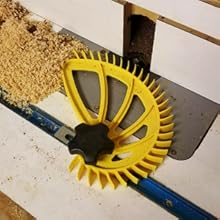 The Hedgehog featherboard being used on a router table