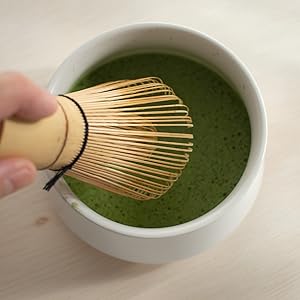 whisking matcha frothy