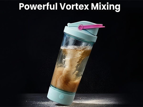 Electric shaker bottle mixing protein powder, coffee, and meal replacement drinks by vortex.