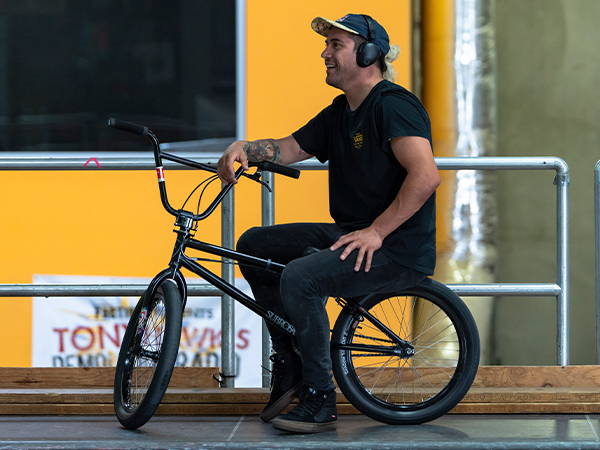 Riding a bike while wearing Jlab Headphones