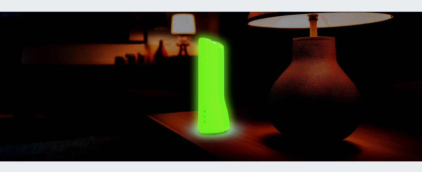 Remote case glowing in the dark on table for easy nighttime visibility