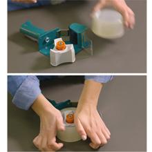 Push roll onto tape wheel