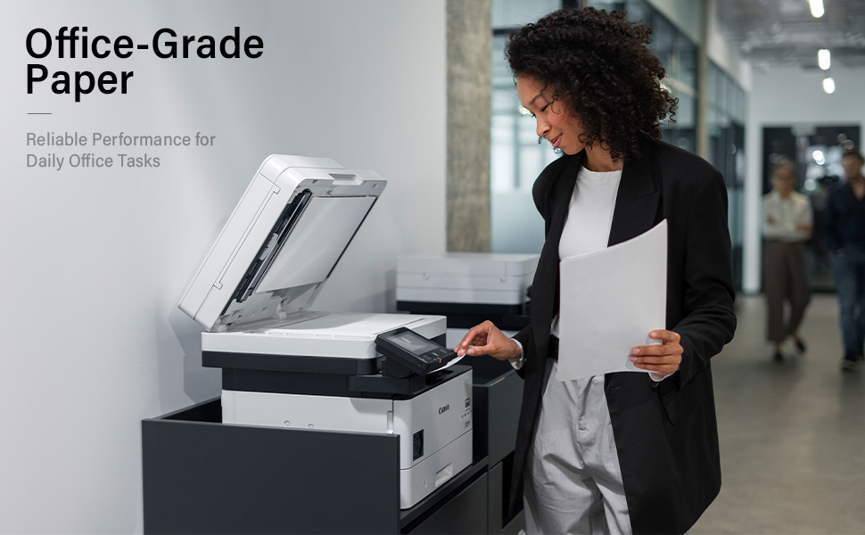 Professional woman using office-grade copy paper with printer for reliable daily office tasks