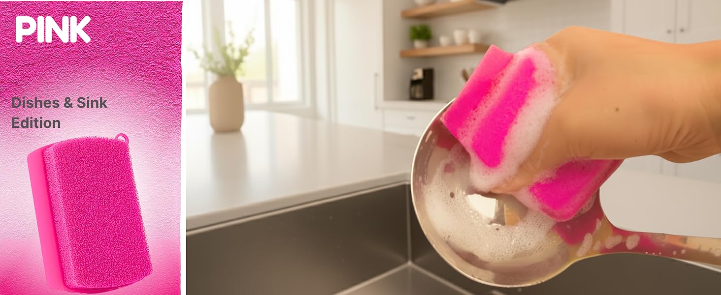 Pink silicone sponge washing spoon with rich foam in kitchen sink