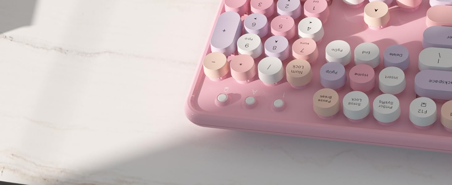 pink colorful wireless keyboard and mouse