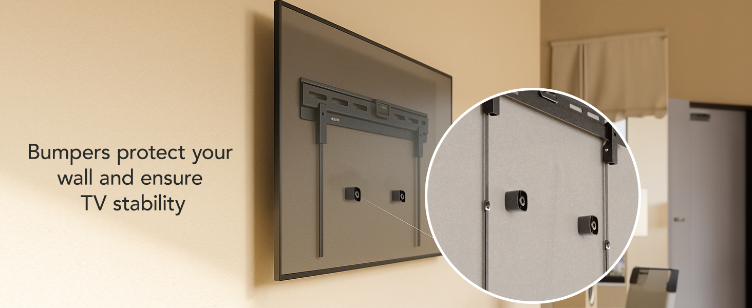 Rear view of TV on studless mount with two bumpers; inset close-up shows wall protection