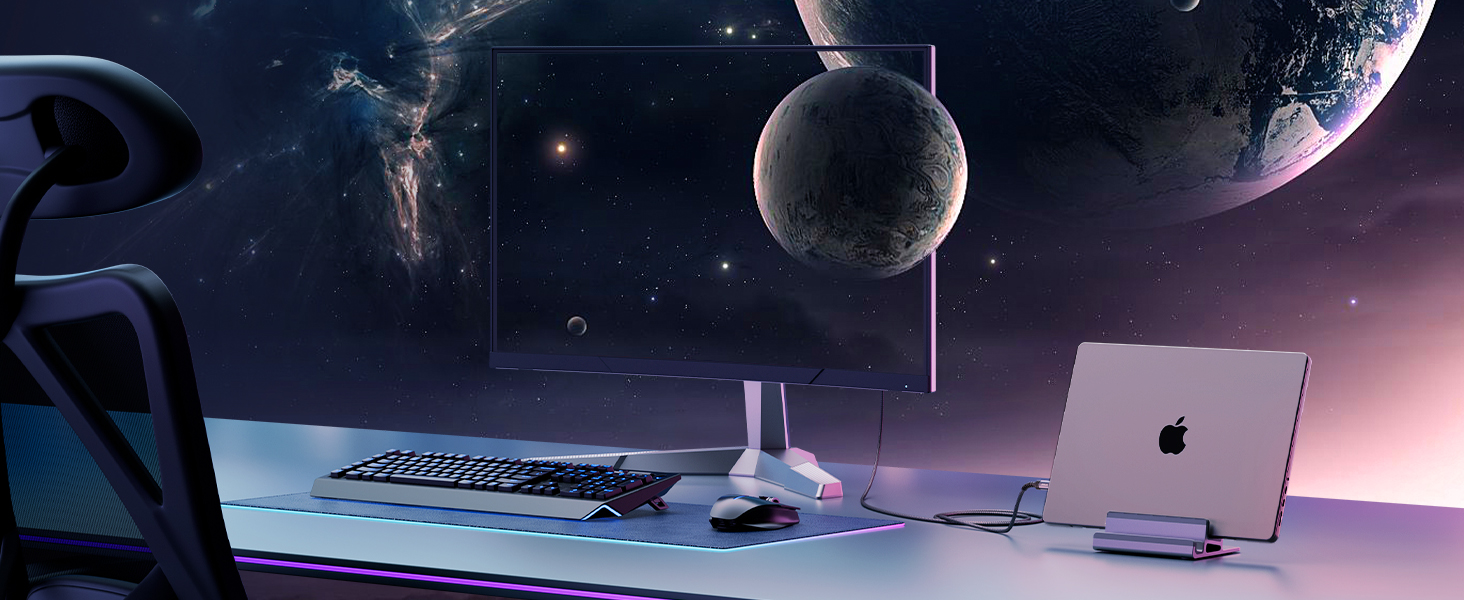 a computer monitor and keyboard with a planet in the background.