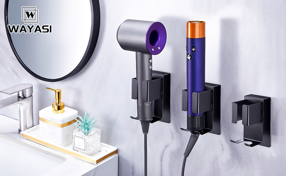 Wall-mounted hairdryer holder system with multiple attachments, featuring black mounting brackets and storage solutions for styling tools.