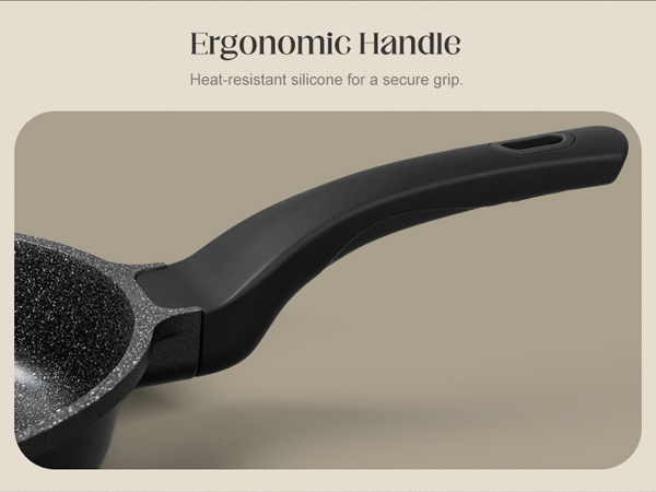 nonstick frying pan with silicone handle, ease of cleaning, works well on all cooktops, durable