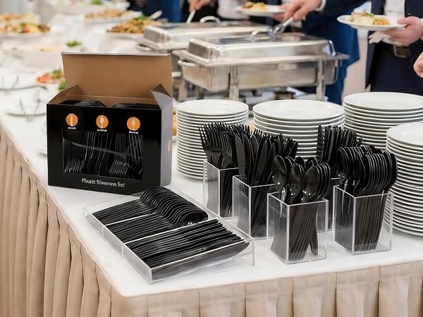 Large packs of disposable knives, forks and spoons used at large banquets