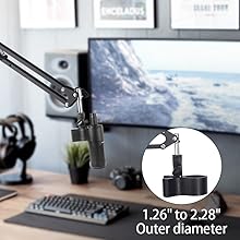 Adjustable desk monitor arm mount with technical specification showing 1.26" to 2.28" outer diameter, shown in desktop setup with computer screen.