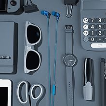 cyan Panasonic RP-TCM125 wired earbuds flat-laid next to a watch, sunglasses, sissors, calculator