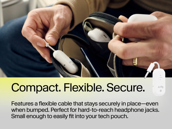 Packing AirFly Pro 2 into travel pouch with tech gear, highlighting its compact, flexible design