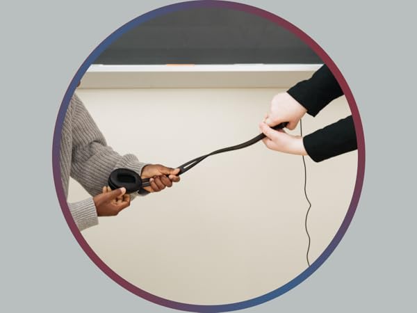 Two children attempting to pull apart a Cyber Acoustics headphones