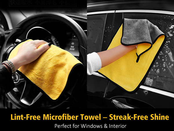 Yellow microfiber towel demonstrated cleaning car interior and window. Dual-sided design with yellow and gray surfaces for lint-free, streak-free cleaning of automotive surfaces.